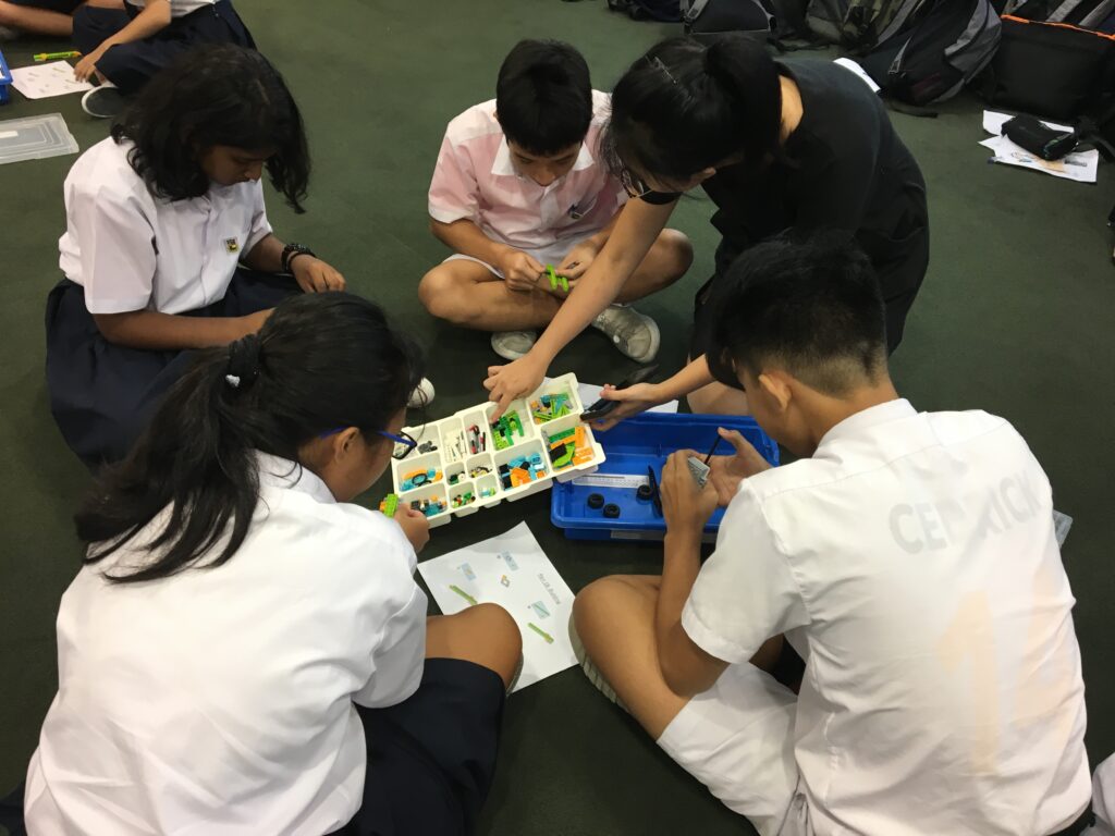 Children learning with LEGO in a school setting